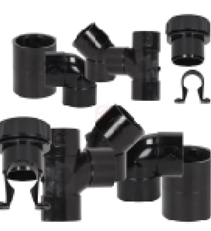 a group of black plastic pipe fittings